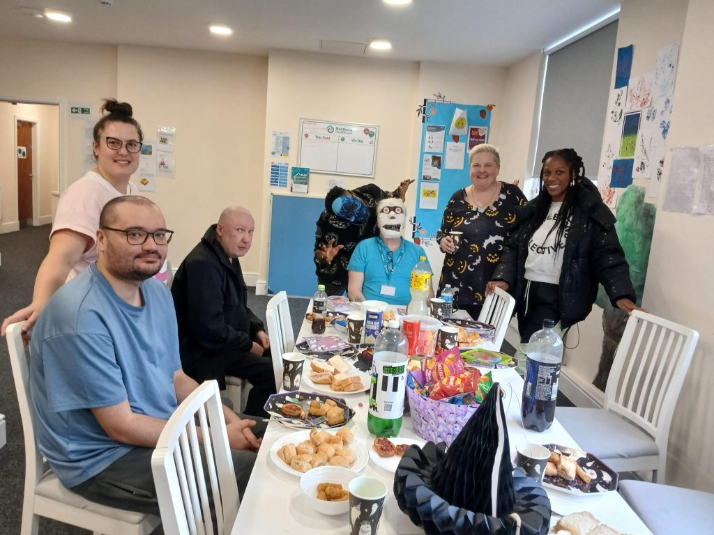 Group of people celebrating halloween